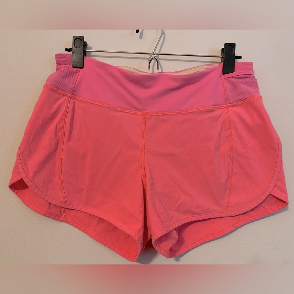Lululemon shorts size 6. Fun peach/pink color